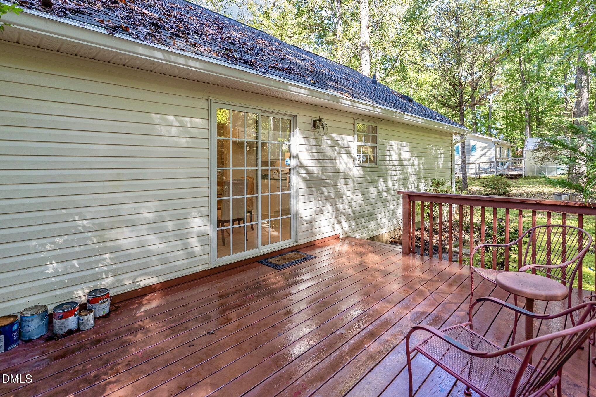 5414 Stanley Road Durham, NC 27704 - Photo 18 of 20 a balcony with wooden floor
