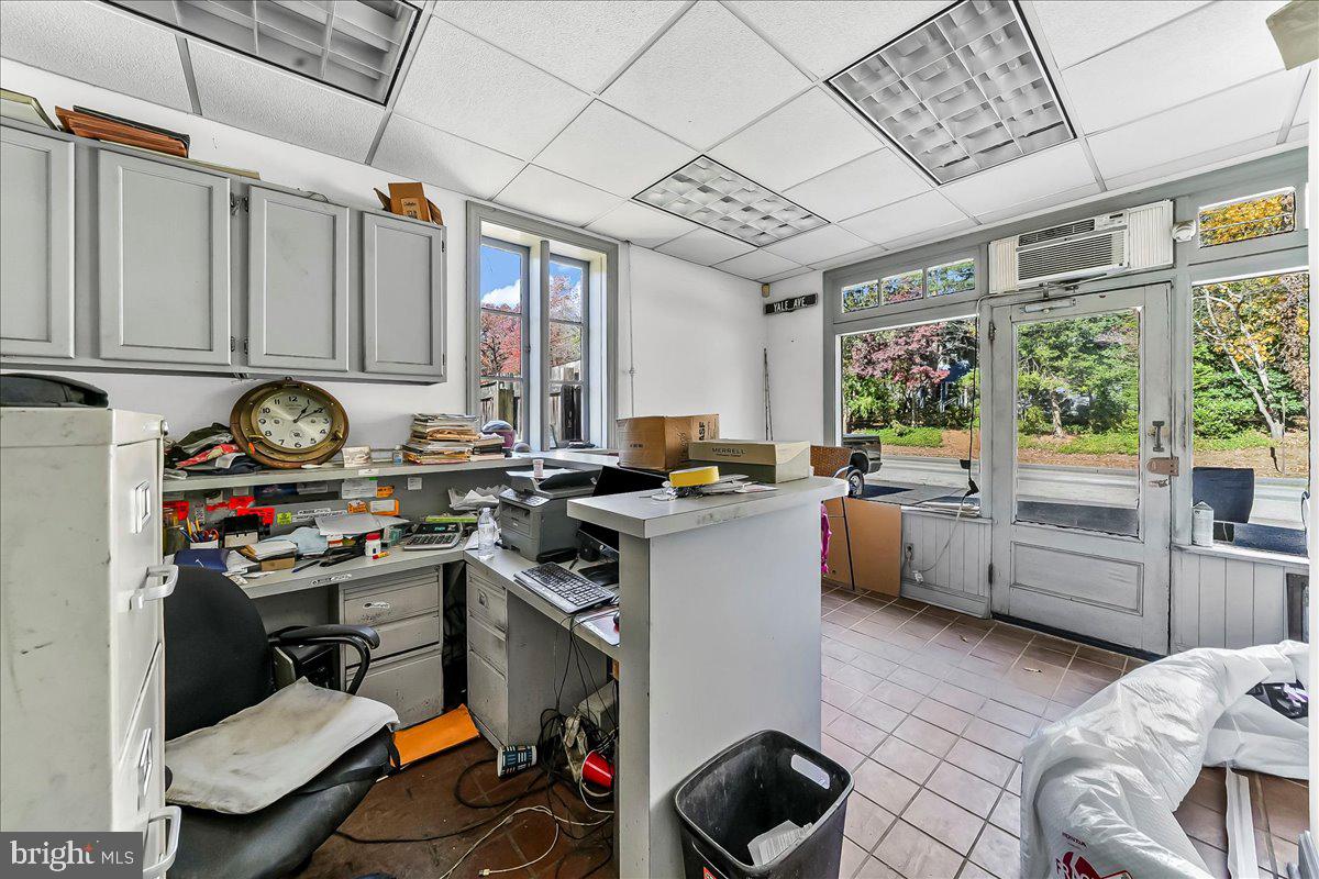 630 Yale Avenue Swarthmore, PA 19081 - Photo 14 of 24 a kitchen with sink refrigerator and cabinets