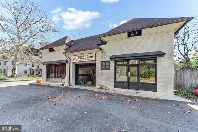 a front view of a house with a garage