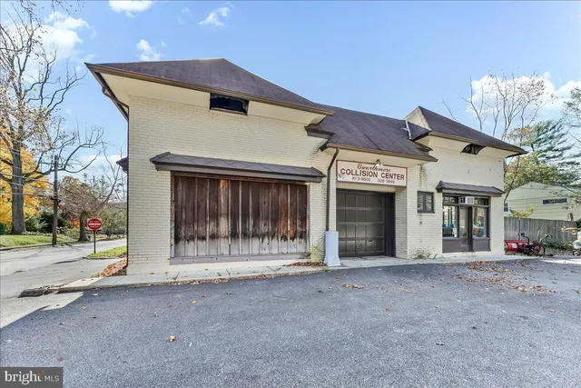 a view of a house with a street