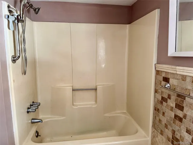 a bathroom with a bathtub