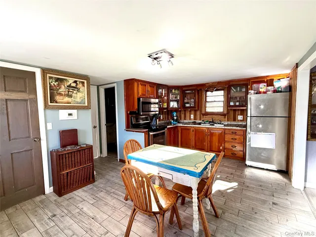 a view of a dining room with furniture
