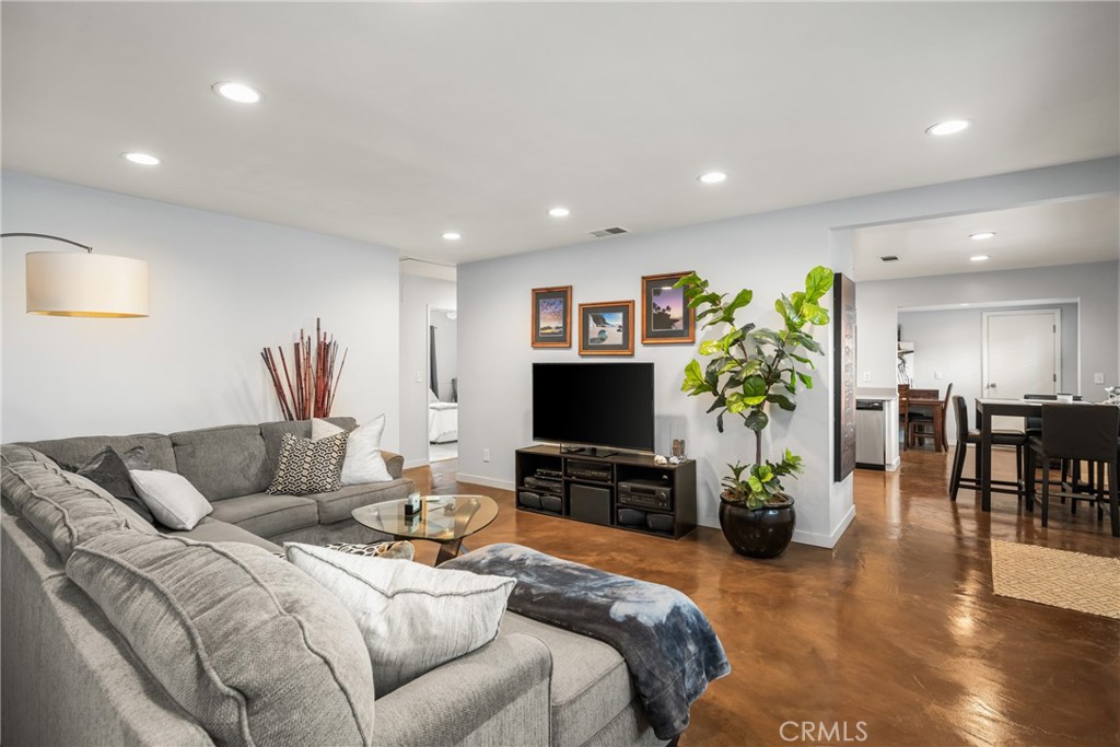 19301 Maynard Way North Tustin, CA 92705 - Photo 1 of 24 Large living room features polished concrete floors.