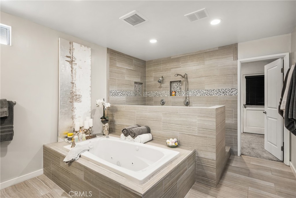 19301 Maynard Way North Tustin, CA 92705 - Photo 12 of 24 Through the bath is the walk-in closet.