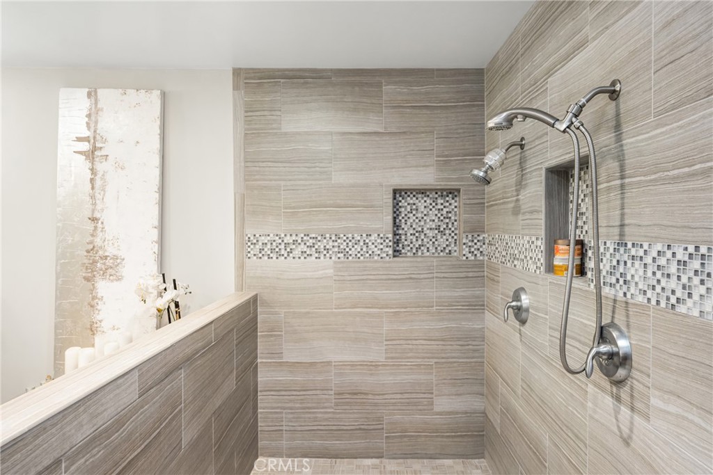 19301 Maynard Way North Tustin, CA 92705 - Photo 10 of 24 Dual shower heads make this shower perfect for two.