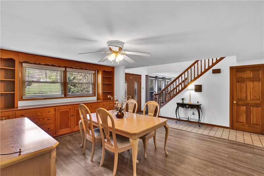 1217 Lovi Road Freedom, PA 15042 - Photo 5 of 39 Spacious Dining Room with Built-ins. New wood laminate flooring.