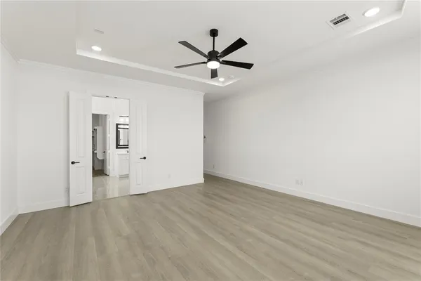 a bathroom with a bathtub sink and mirror