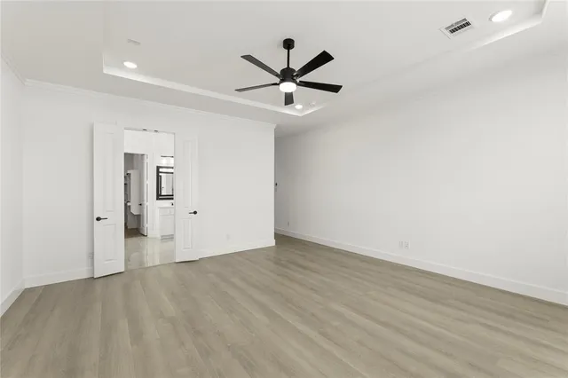 a bathroom with a bathtub sink and mirror