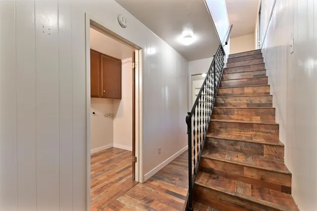 a view of entryway with wooden floor