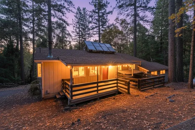 a view of outdoor space with garden and deck