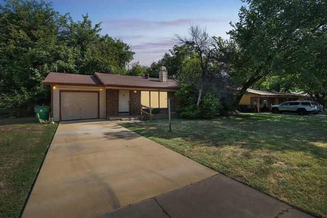 front view of a house with yard