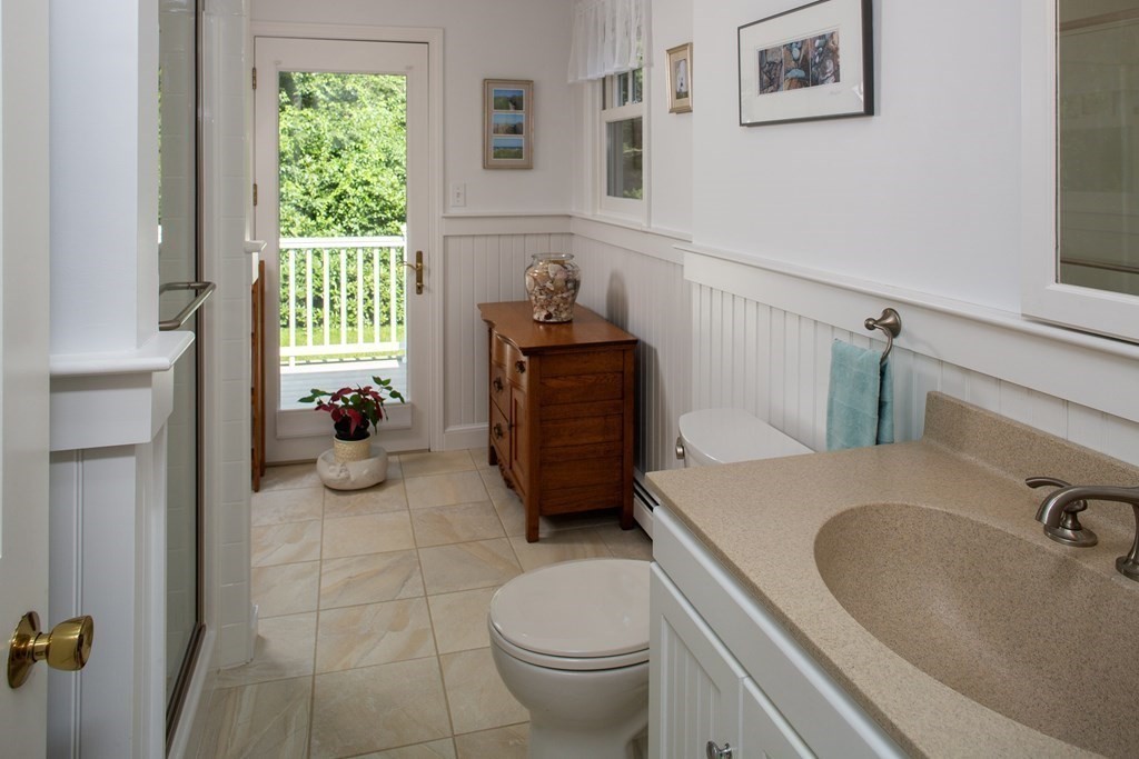 40 Union Hall Road Duxbury, MA 02332 - Photo 14 of 18 a bathroom with a sink toilet and window