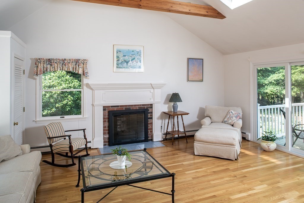 40 Union Hall Road Duxbury, MA 02332 - Photo 3 of 18 a living room with furniture and a fireplace