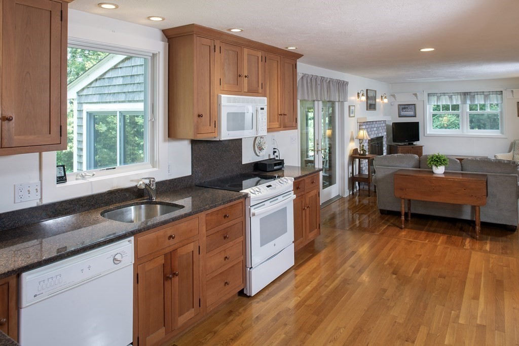 40 Union Hall Road Duxbury, MA 02332 - Photo 5 of 18 a kitchen that has a sink and a stove top oven