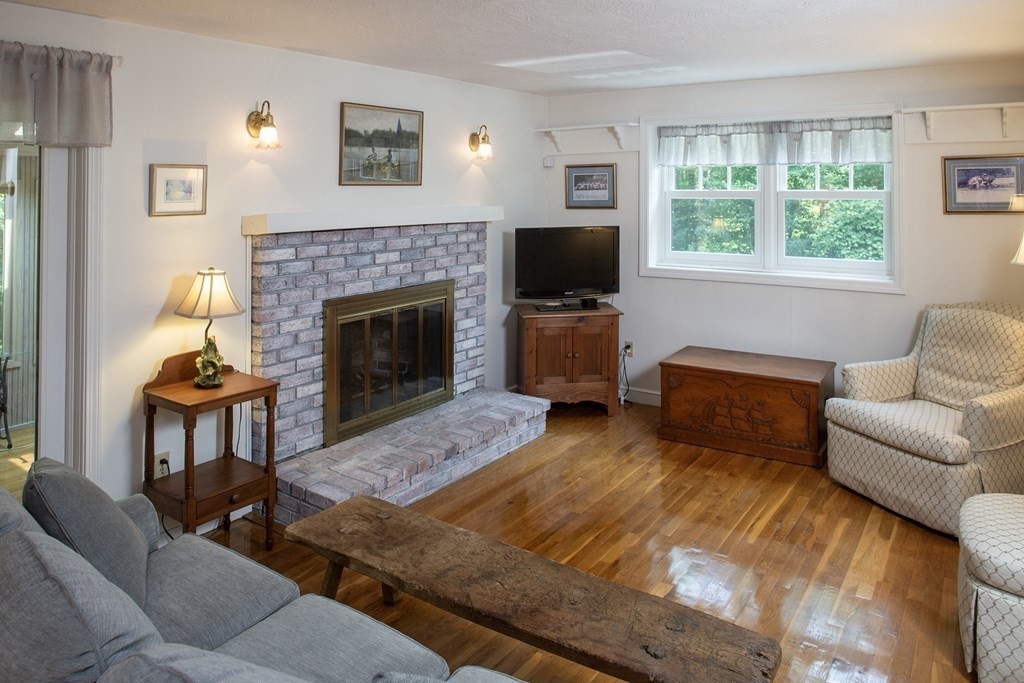 40 Union Hall Road Duxbury, MA 02332 - Photo 6 of 18 a living room with furniture fireplace and window