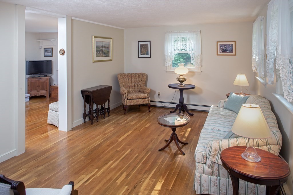 40 Union Hall Road Duxbury, MA 02332 - Photo 8 of 18 a living room with furniture and a wooden floor