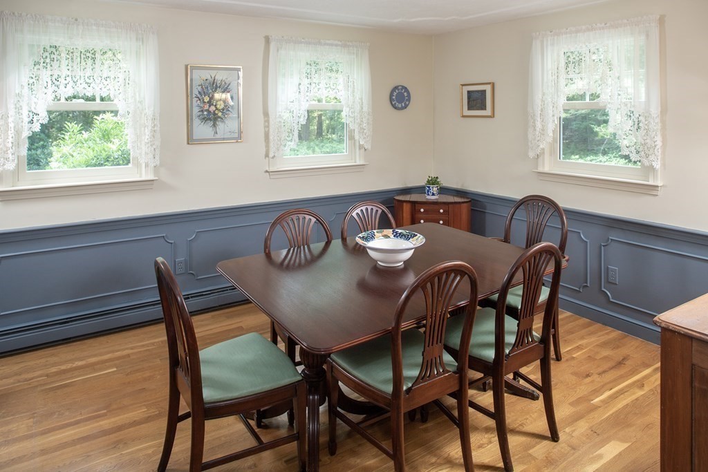 40 Union Hall Road Duxbury, MA 02332 - Photo 9 of 18 a view of a dining room with furniture window and outside view