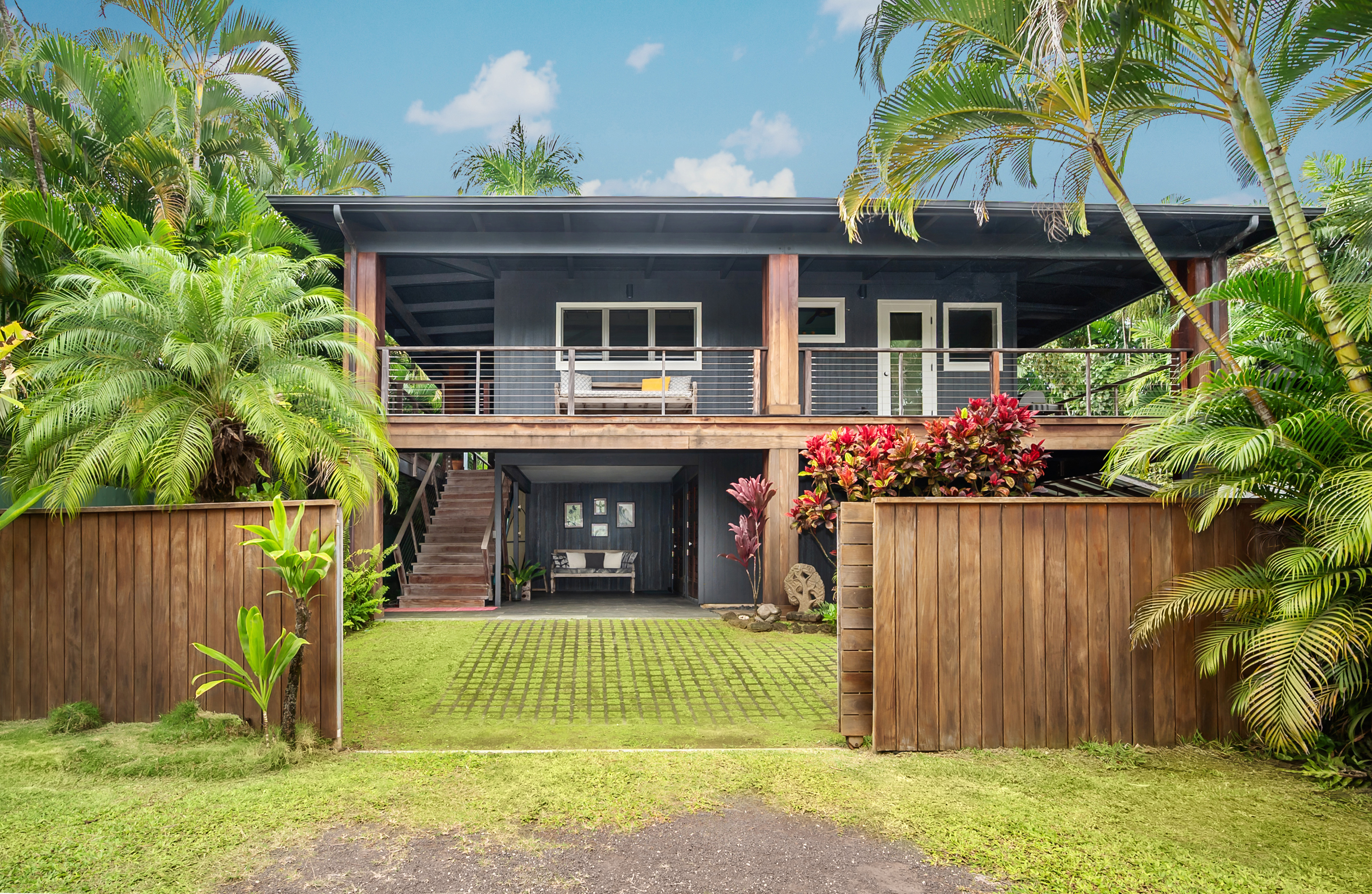 5410 Weke Road Hanalei, HI 96714 - Photo 2 of 23 a front view of a house with garden
