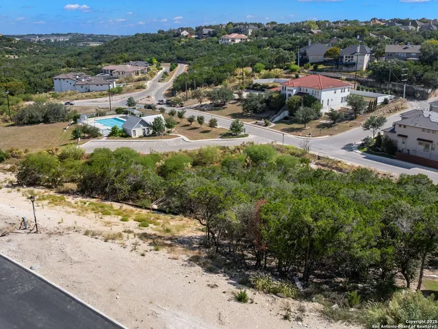 a view of a town with mountains