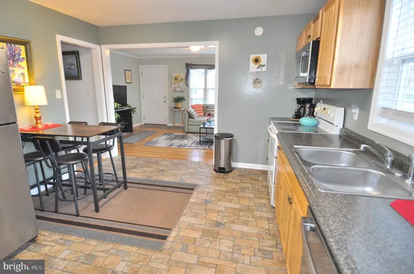 a bedroom with a bed and a lamp