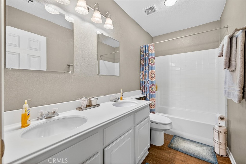 807 Lomond Drive Riverside, CA 92508 - Photo 38 of 47 Hall bathroom also has dual sings and full shower/tub combo.