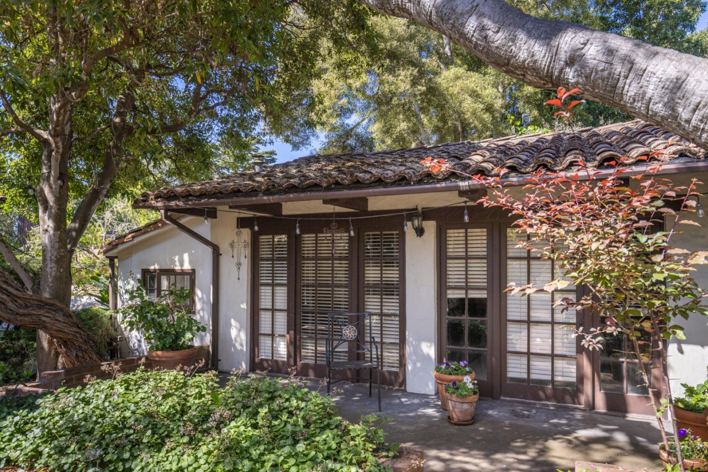 25286 Hatton Road Carmel, CA 93923 - Photo 29 of 34 a front view of a house with a garden