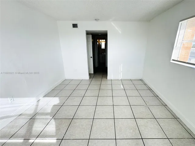 a bathroom with a sink toilet a mirror and shower