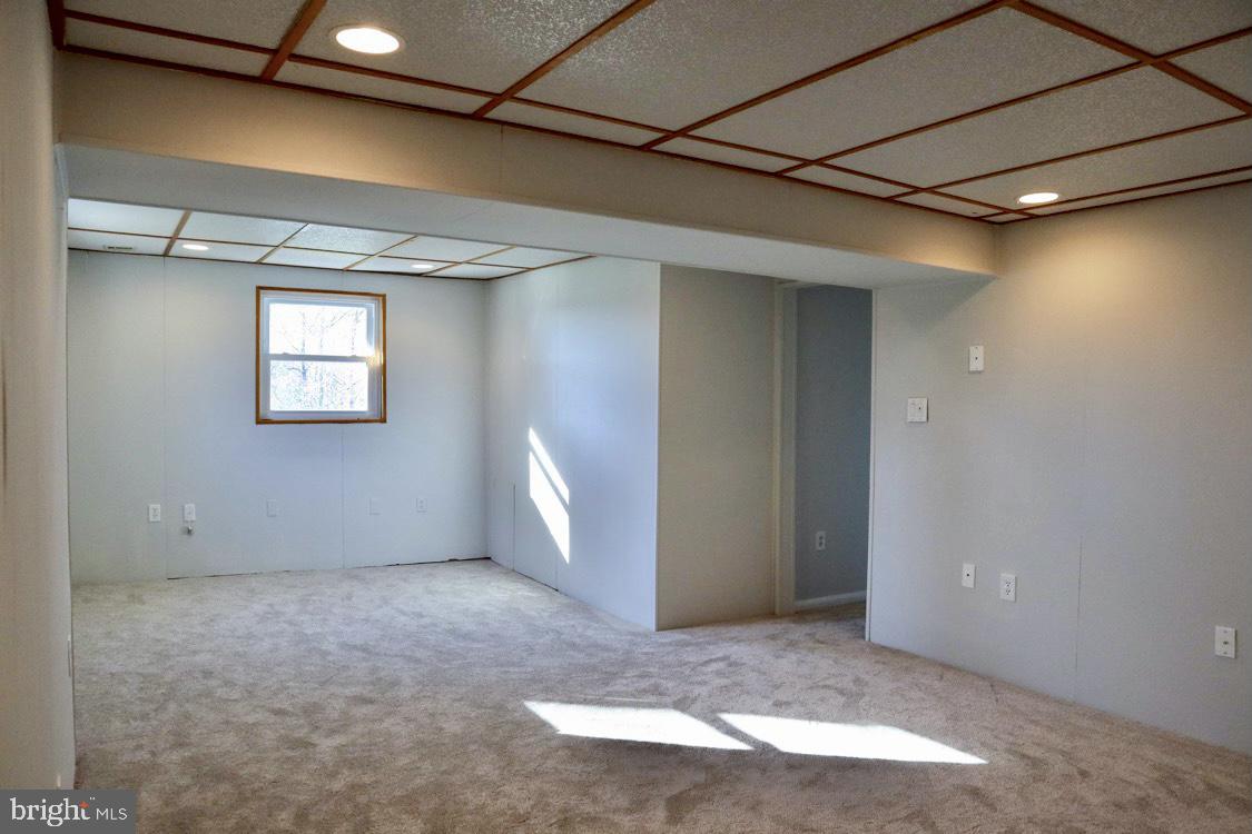 6510 Haystack Road Alexandria, VA 22310 - Photo 13 of 17 Rec room on lower level with fresh carpet