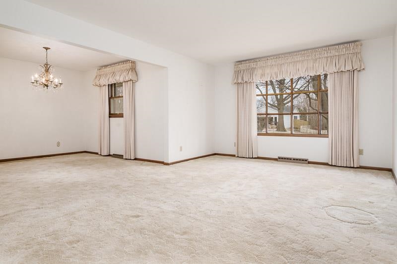 1110 Roxbury Close Rockford, IL 61107 - Photo 3 of 36 an empty room with windows and closet
