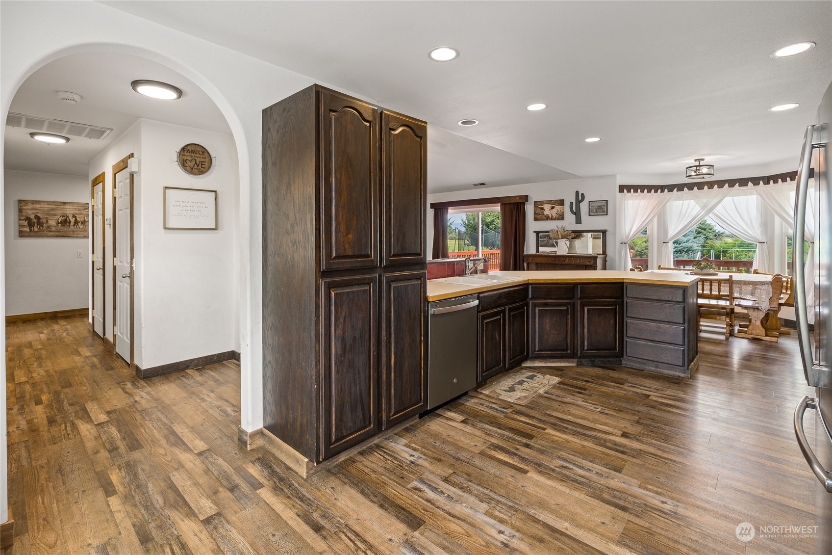 720 Klocke Road Ellensburg, WA 98926 - Photo 17 of 40 a kitchen with stainless steel appliances granite countertop a refrigerator and a sink