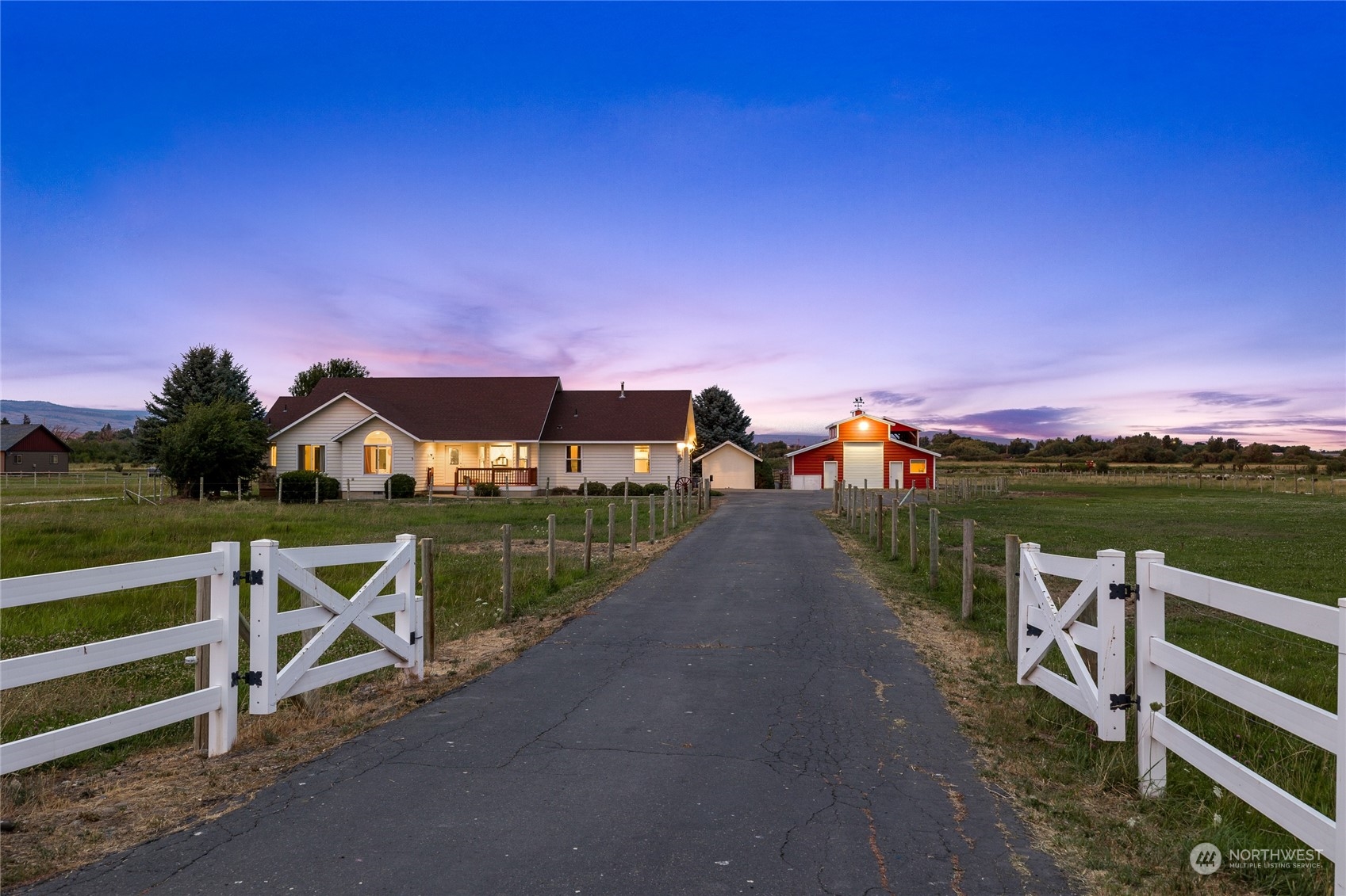 720 Klocke Road Ellensburg, WA 98926 - Photo 3 of 40 a view of a lake with a garden