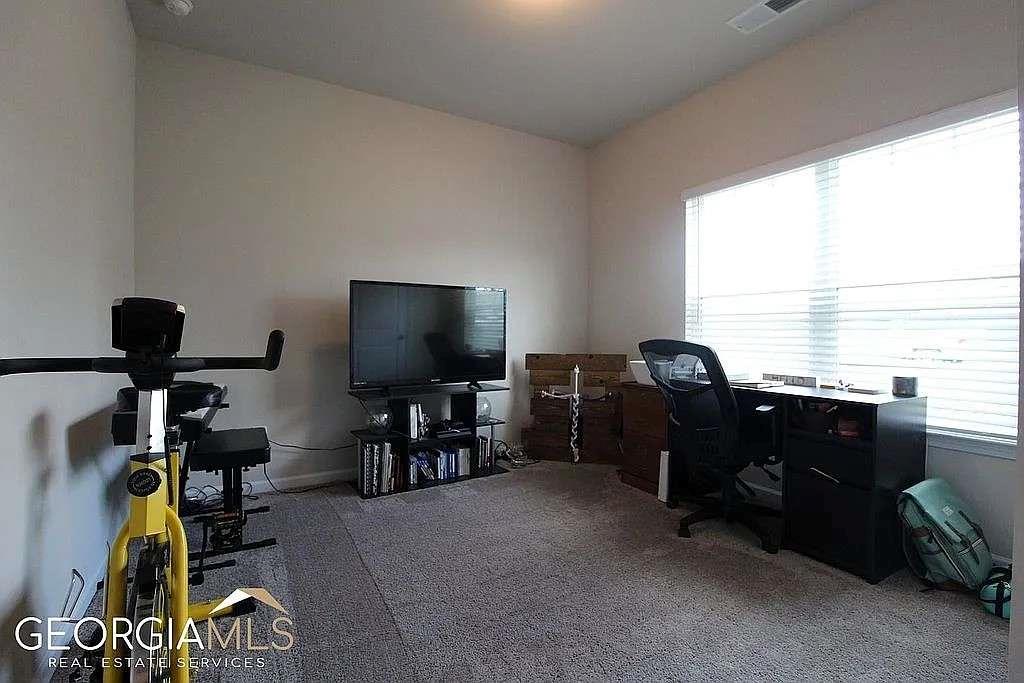 6 Gala Drive Northeast Rome, GA 30165 - Photo 7 of 11 a view of a livingroom with workspace and a window