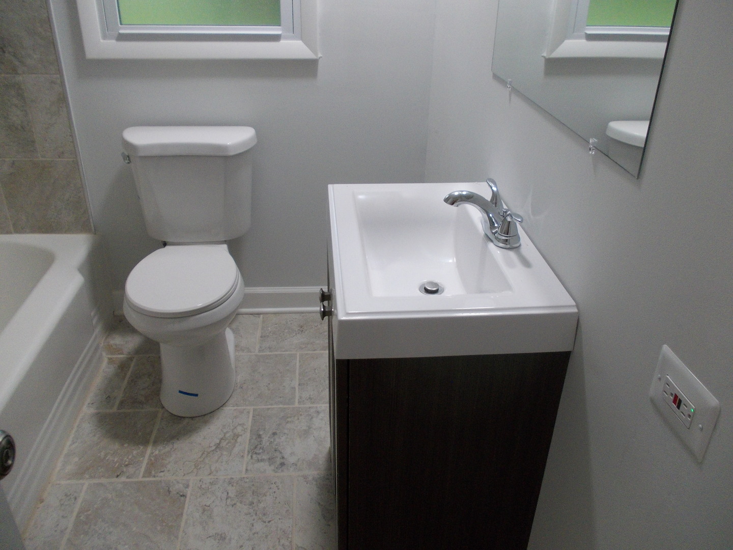 1418 Hillview Road Homewood, IL 60430 - Photo 10 of 19 a bathroom with a toilet sink and mirror