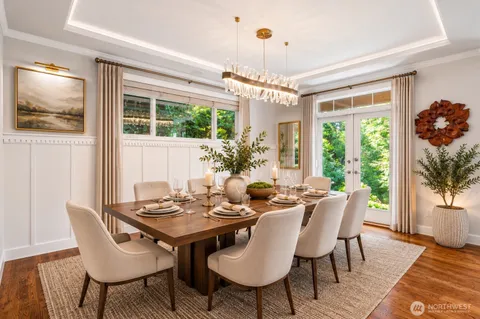 a view of a dining room with furniture window and outside view