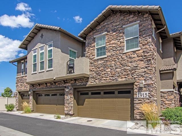 1915 Wind Ranch Road, Unit C Reno, NV 89521 - Photo 1 of 15 a front view of a house