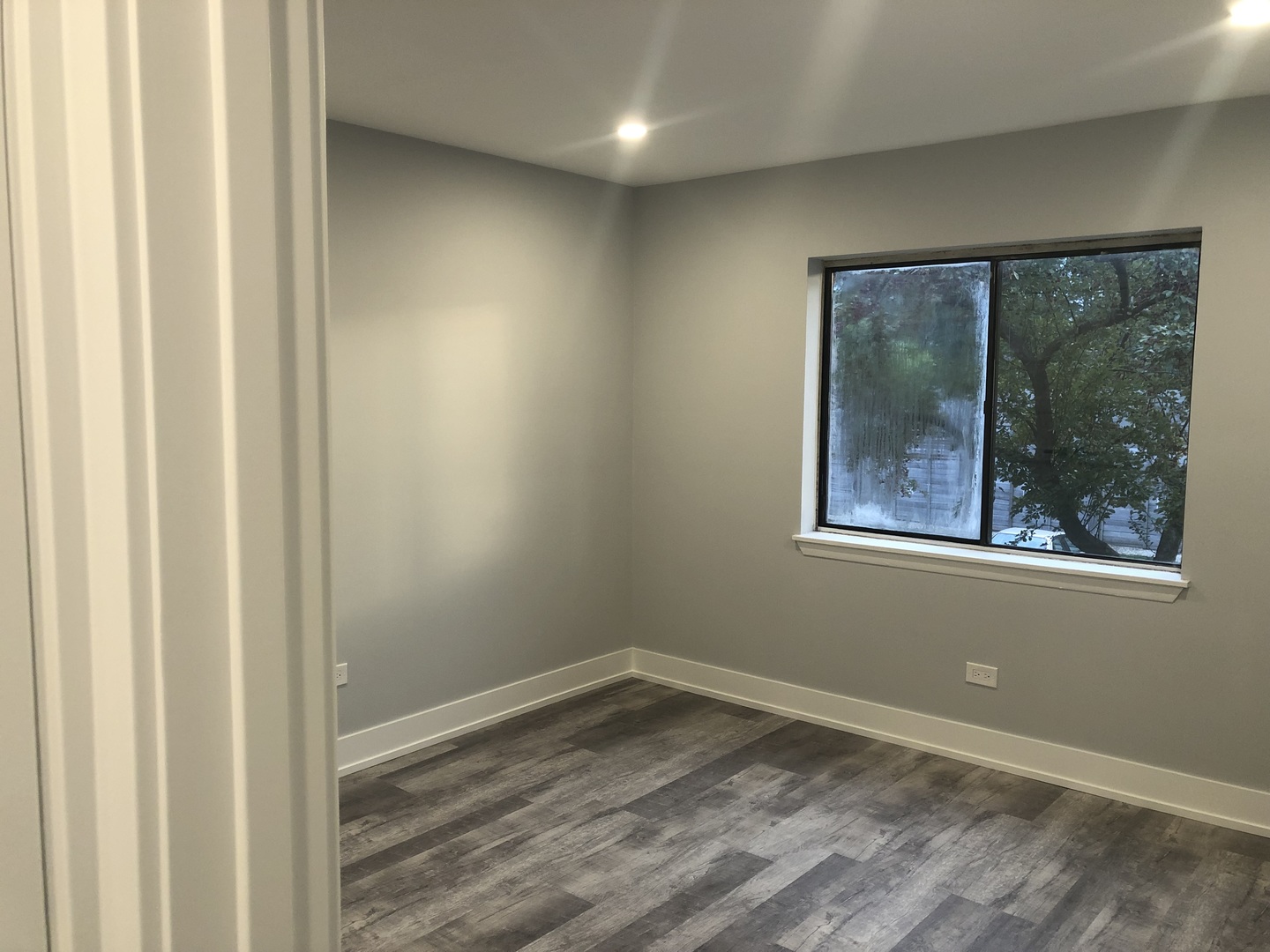 2243 West Nichols Road, Unit C Arlington Heights, IL 60004 - Photo 9 of 10 a view of empty room with window