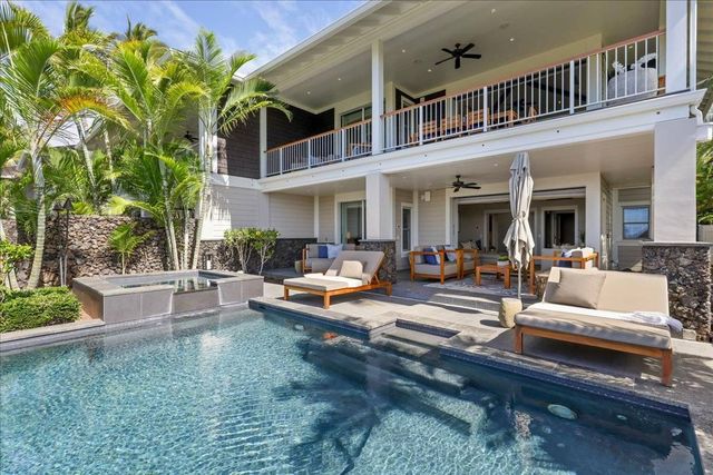 a outdoor space with patio the couches and a potted plant