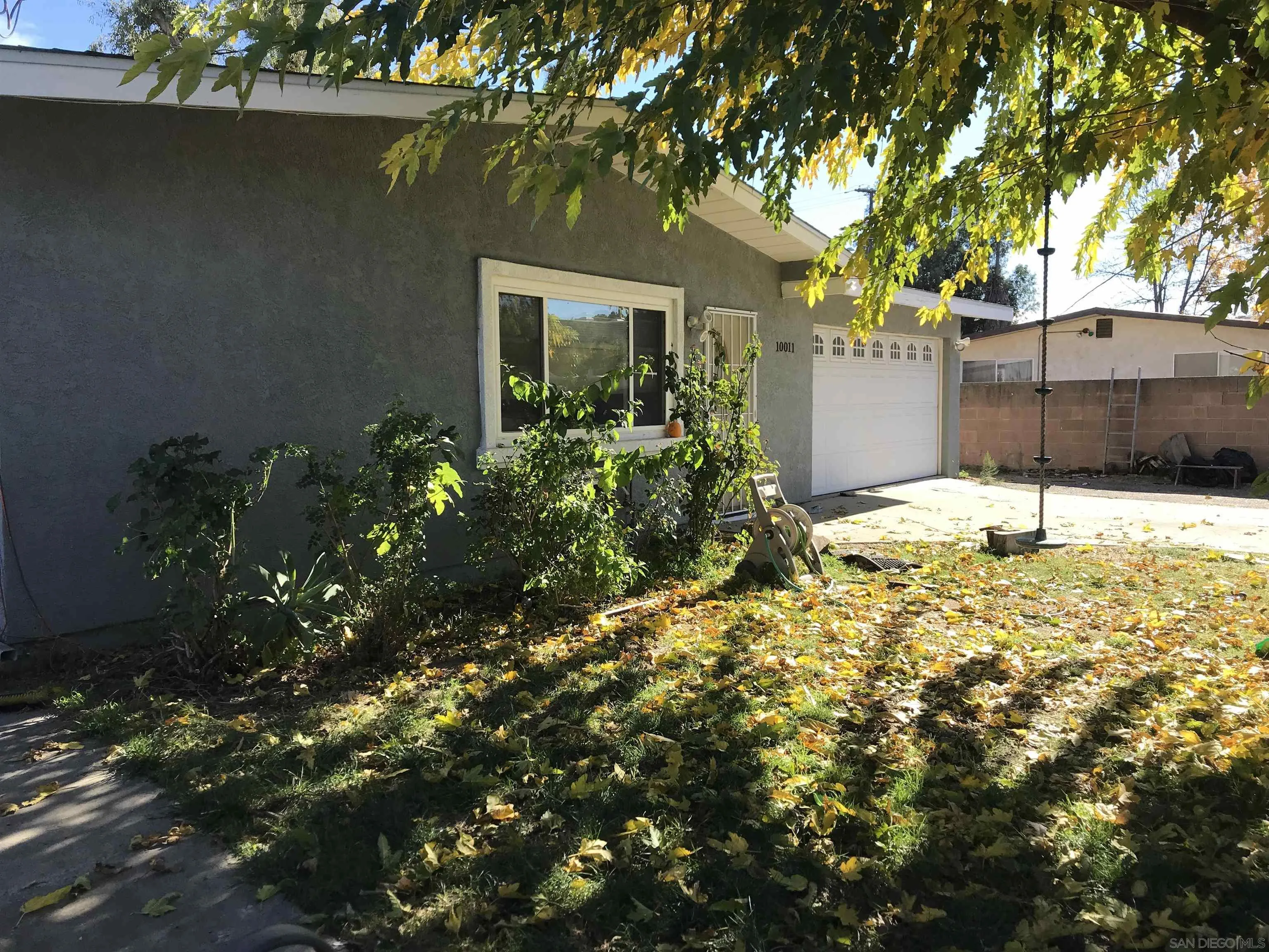 10011 Tamil Road Lakeside, CA 92040 - Photo 2 of 14 a backyard of a house with lots of green space