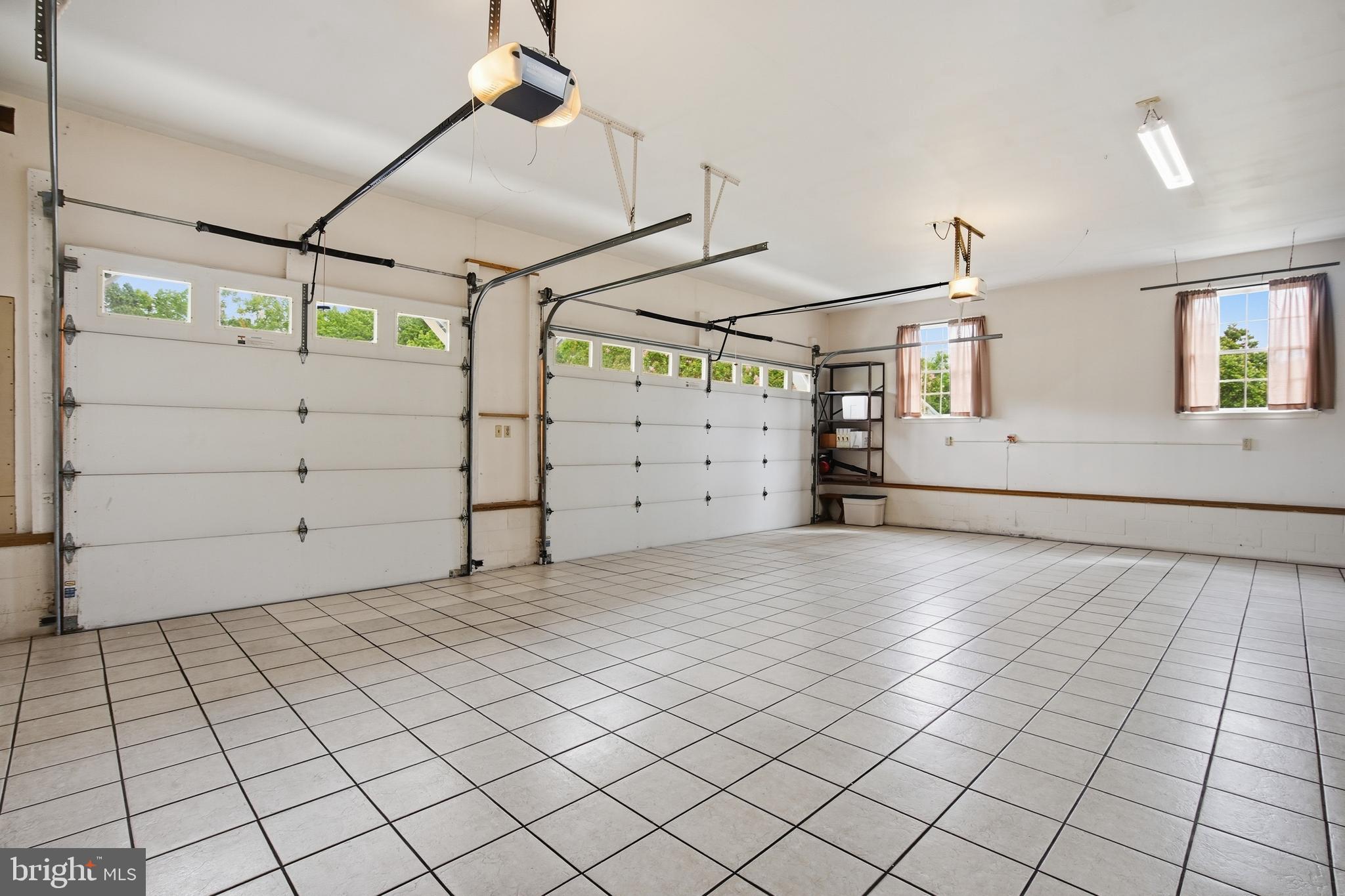 35608 Seagull Road Selbyville, DE 19975 - Photo 21 of 37 Garage interior
4 Cars, fully tiled space