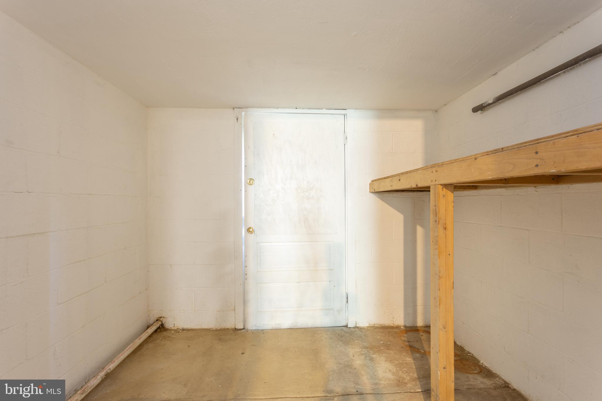 8102 Sumter Avenue Rosedale, MD 21237 - Photo 30 of 40 storage area in basement door to outside