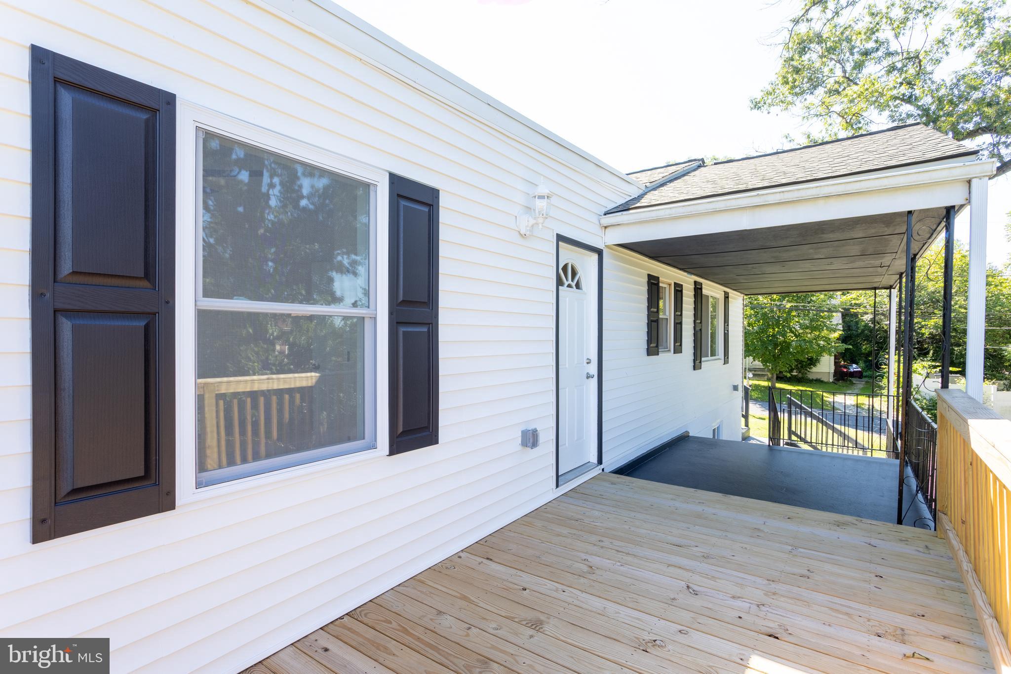 8102 Sumter Avenue Rosedale, MD 21237 - Photo 31 of 40 back door and deck