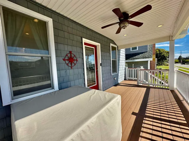 a very nice looking bedroom with a large window