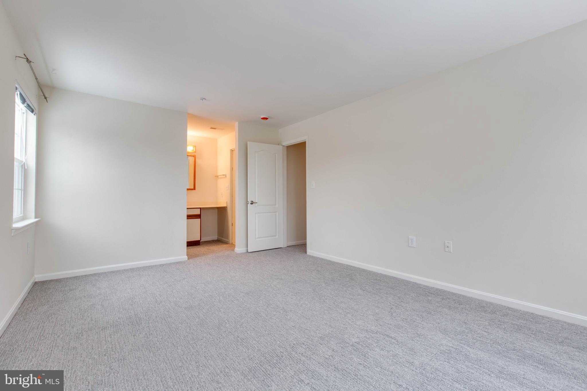 8399 Montgomery Run Road, Unit G Ellicott City, MD 21043 - Photo 18 of 31 a view of empty room
