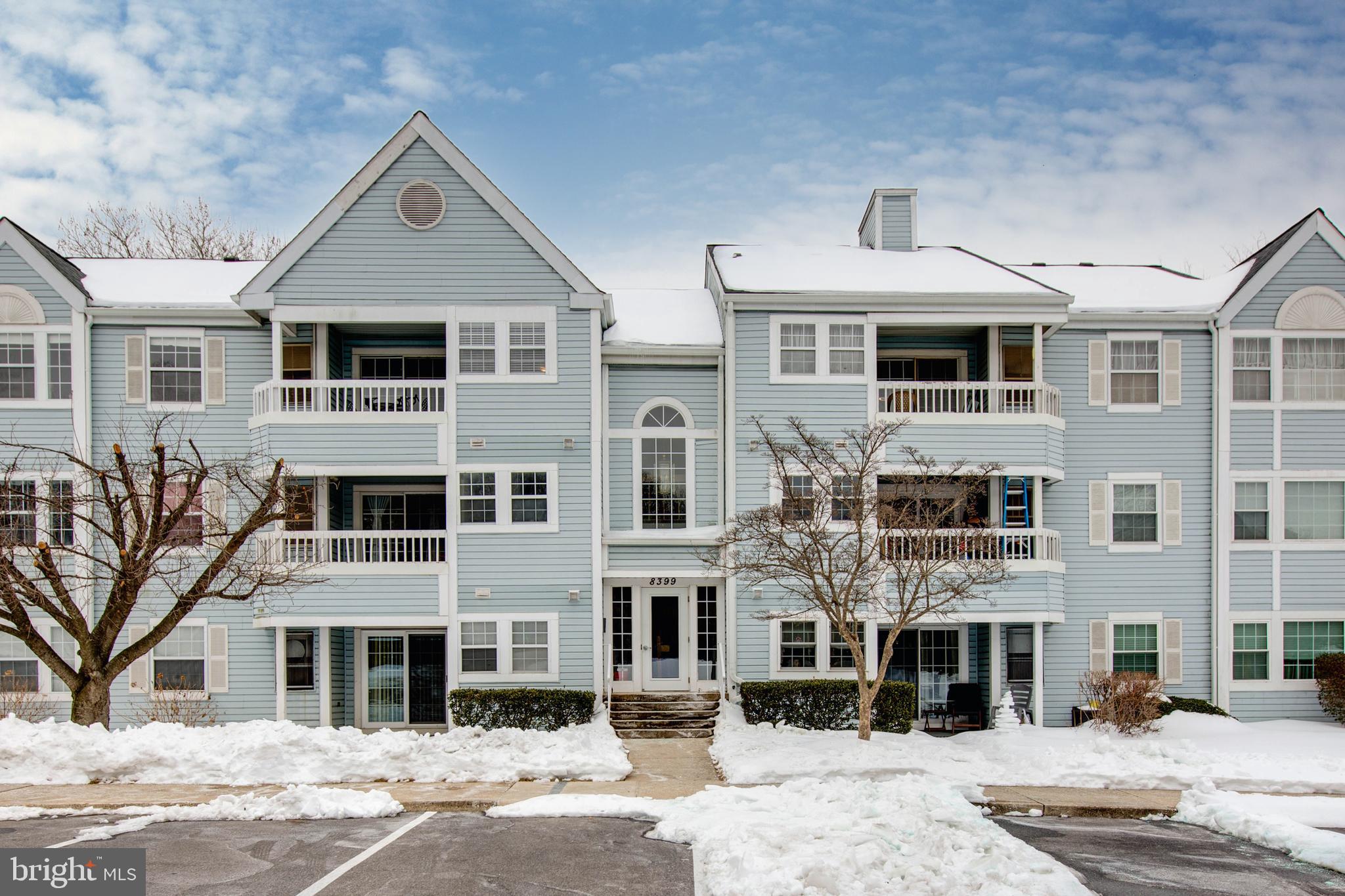 8399 Montgomery Run Road, Unit G Ellicott City, MD 21043 - Photo 2 of 31 a front view of a building with a street