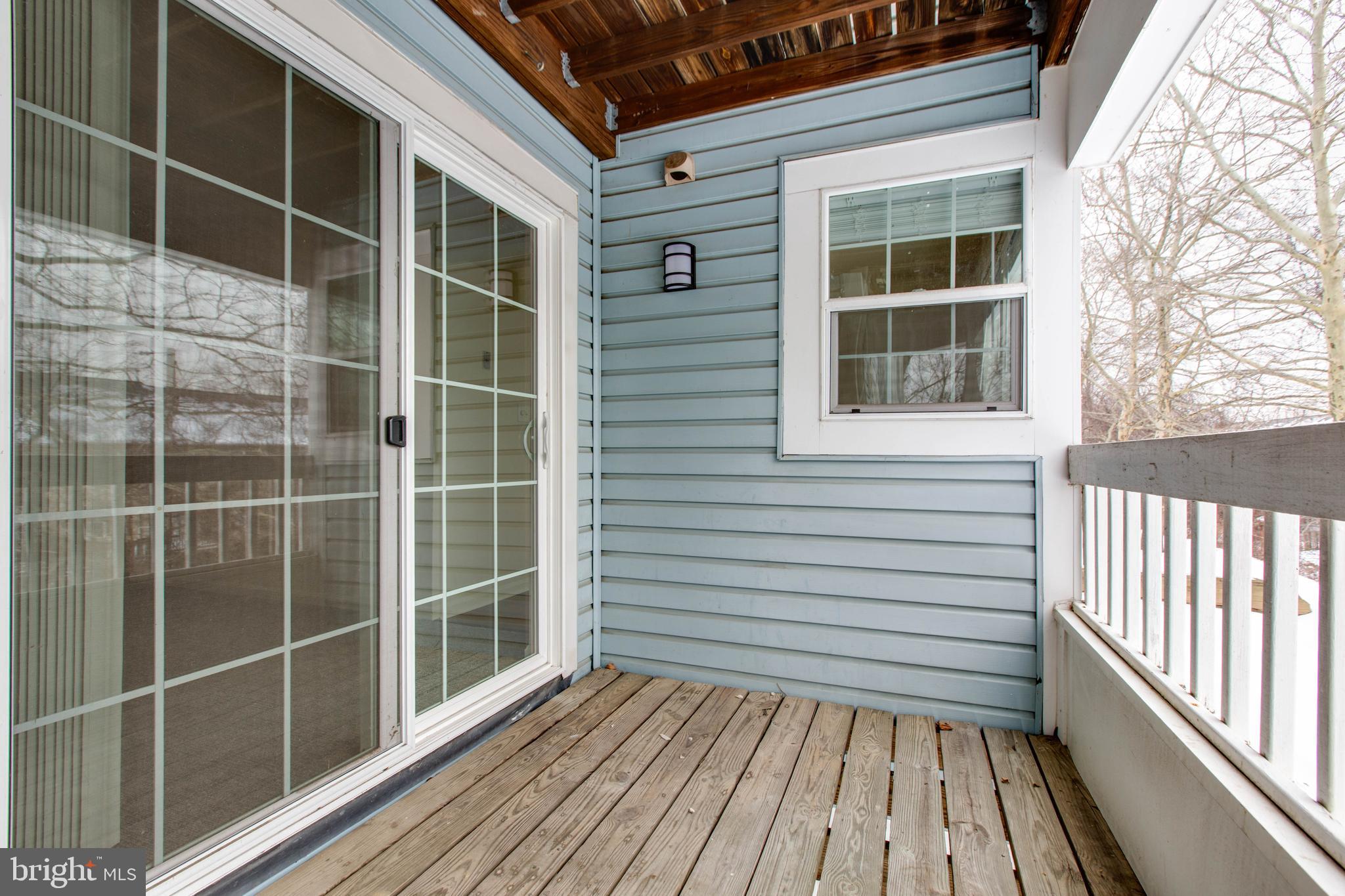 8399 Montgomery Run Road, Unit G Ellicott City, MD 21043 - Photo 31 of 31 a view of a balcony with a window