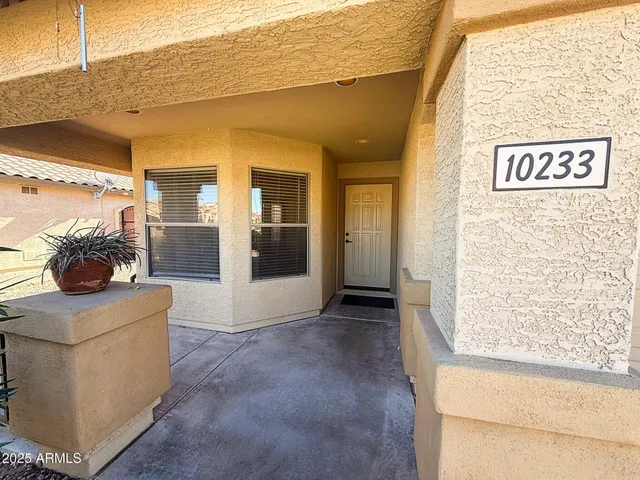 a living room with a couch and a table