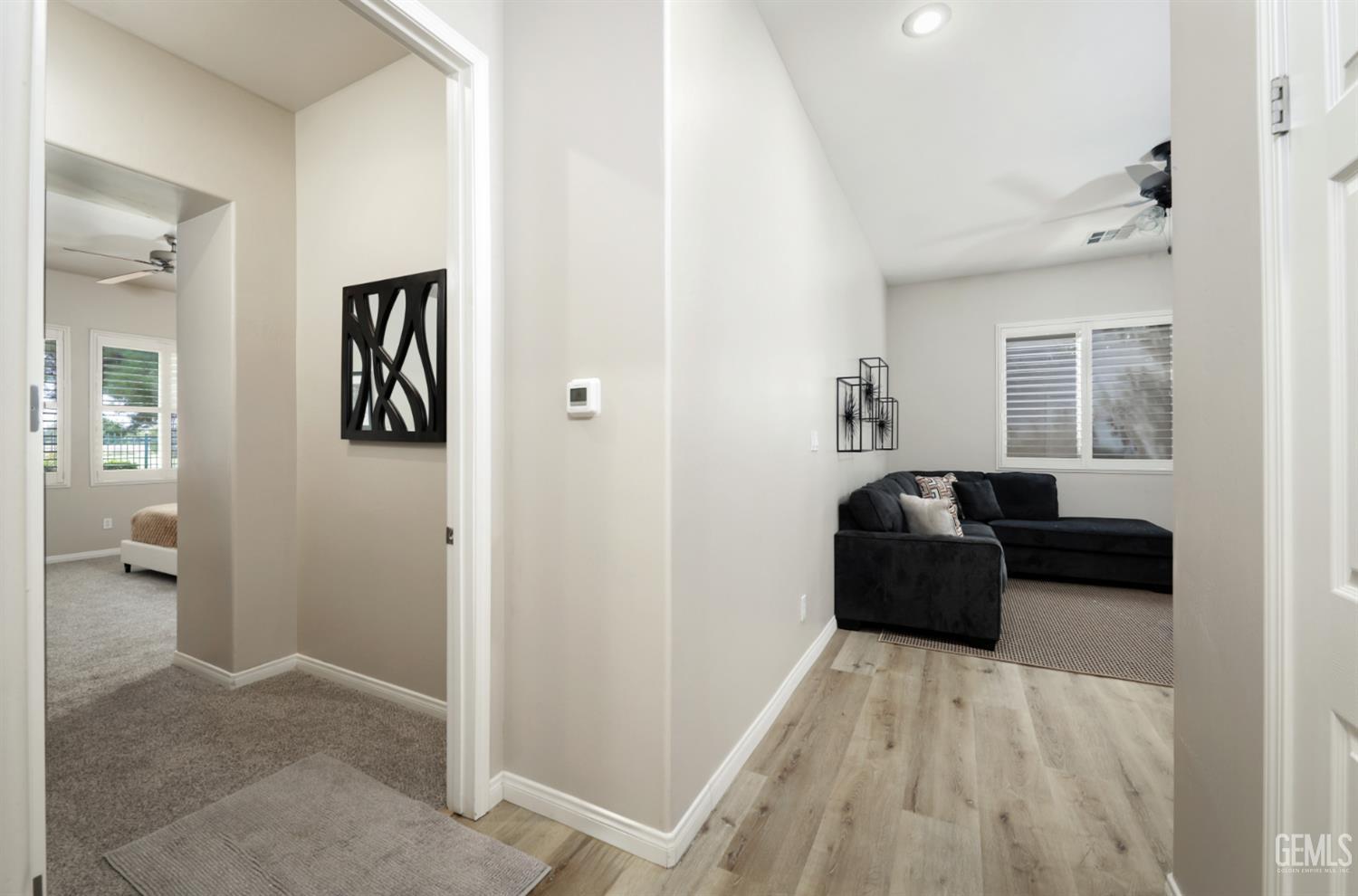 Undisclosed Address Bakersfield, CA 93312 - Photo 17 of 44 a living room with furniture and a couch