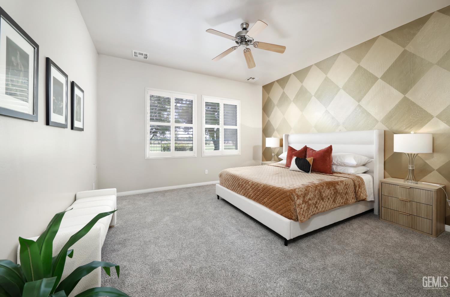 Undisclosed Address Bakersfield, CA 93312 - Photo 21 of 44 a bedroom with a bed and a chandelier