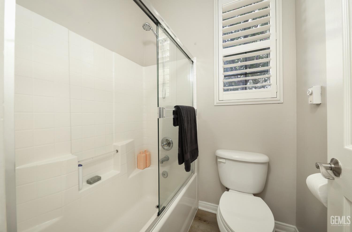 Undisclosed Address Bakersfield, CA 93312 - Photo 28 of 44 a bathroom with a toilet and a shower