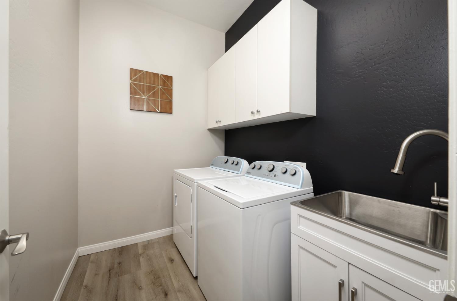 Undisclosed Address Bakersfield, CA 93312 - Photo 31 of 44 a utility room with dryer and washer